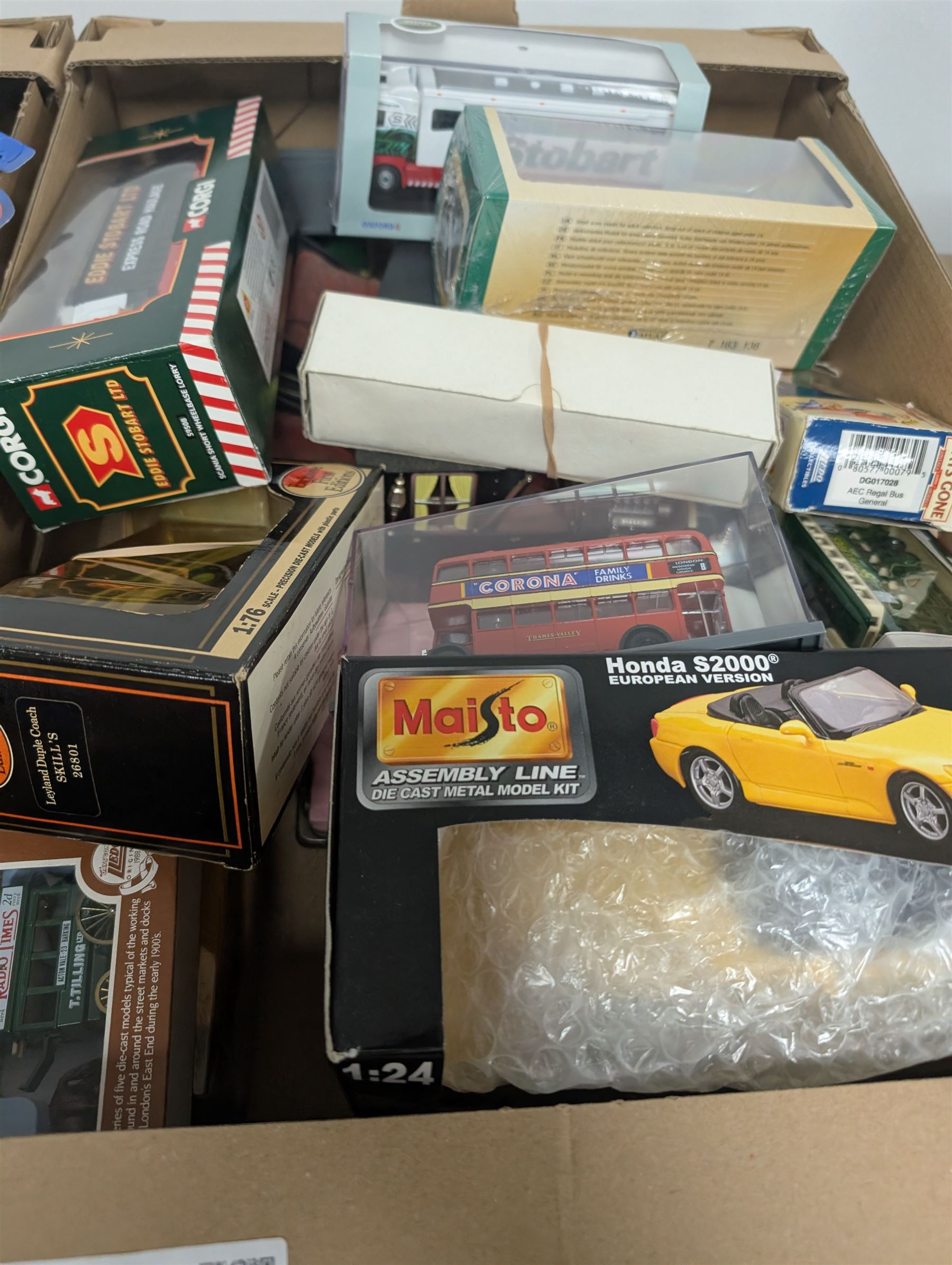 Collection of diecast model vehicles, including two Munster Koaches, Maisto Hondo S2000, NewRay cars, Hotwheels, etc