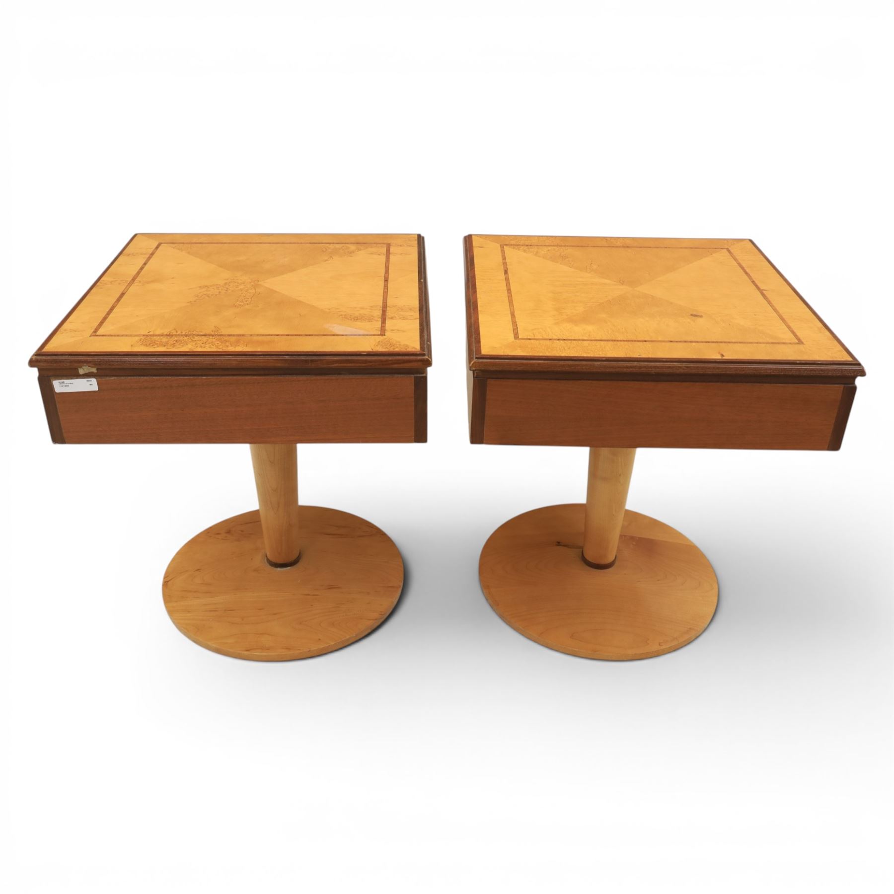 Art Deco style pair of walnut bedside tables, quarter matched veneered tops with crossbanded borders, fitted with single frieze drawers with chrome handles, on circular pedestal supports