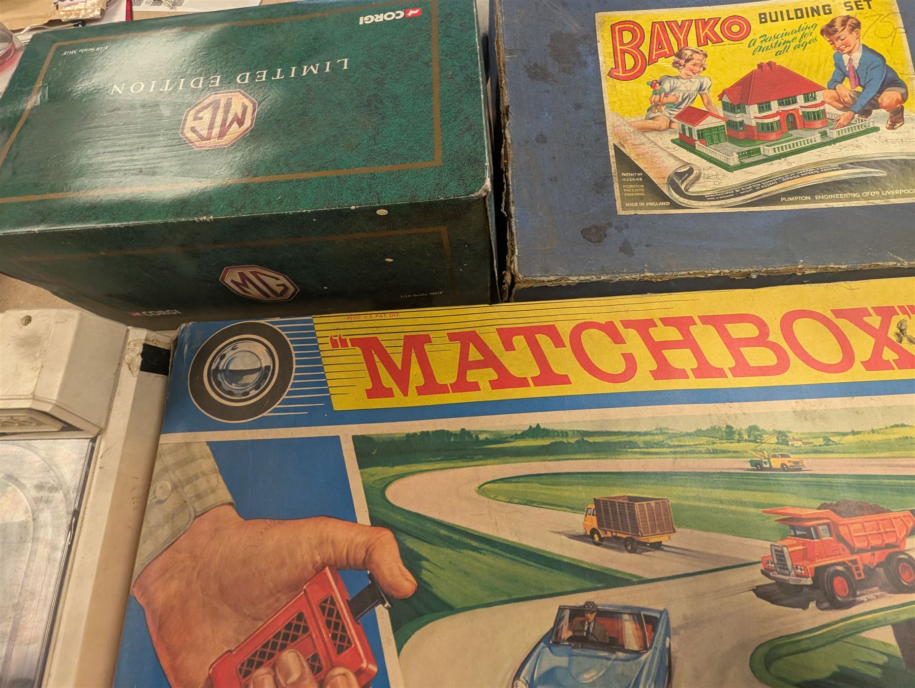 Collection of vintage toys and games, including Chad Valley Escalado, Corgi 1:18 scale MG diecast model, Bayko Building Set, Matchbox Motorised Motorway, etc