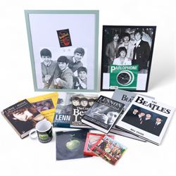 The Beatles memorabilia, including 1964 Fan Club patch, framed with a black and white pict...