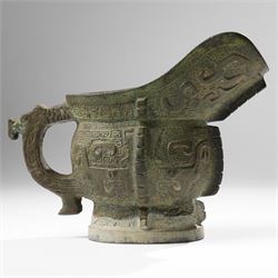 Chinese archaistic bronze wine vessel, Shang dynasty style but 20th century, W25cm; together with a Tang dynasty style model of a rearing horse, H17.5cm (2)