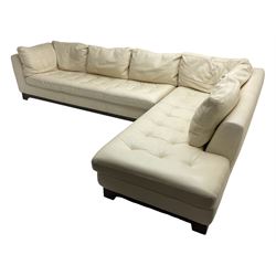 Roche-Bobois - large corner sofa, upholstered in ivory leather with buttoned seat cushions, raised on a stained beech base with bracket feet