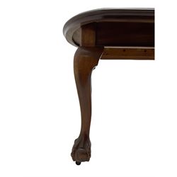 Early 20th century mahogany dining table, fixed moulded top with curved end, on cabriole supports with ball and claw feet with castors