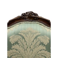 19th century walnut framed chair, the shaped back carved with foliage cartouche, on scrolled carved cabriole supports, upholstered in pale green patterned fabric