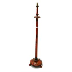 Early 20th century Chinese style red painted standard lamp, turned tapering column on base