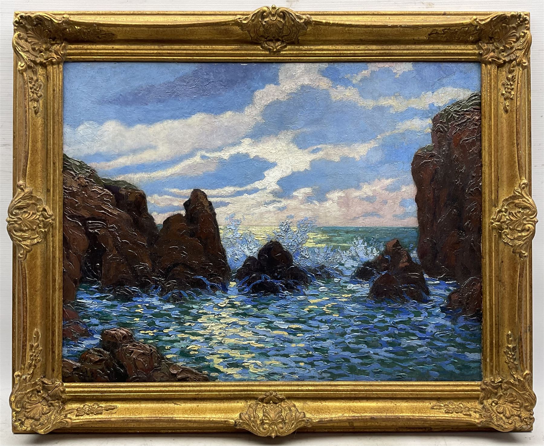 Circle of Henry Moret (French 1856-1913): Sunlit Rocky Coastline, oil on canvas laid on to panel indistinctly signed l.l. 49cm x 64cm