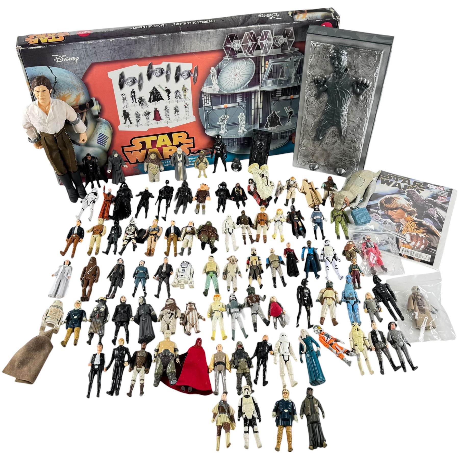 Collection of Hasbro Star Wars figures, including Han Solo prisoner action figure and loose 3.75 inch figures, Stor Disney Star Wars Death Star and a Modern Age Marvel Star Wars comic book issue #12
