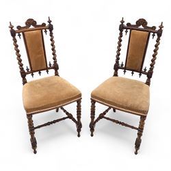 Pair of 19th century oak hall chairs, shield form backs with carved scroll cresting and fi...
