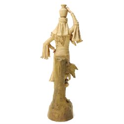 Pair of Ernst Wahliss for Turn Wien porcelain figures of Middle Eastern water carriers, taller figure H35cm