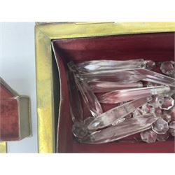 Collection of victorian and later brass desk accessories, to include a letter holder with cherub design, ink well of square form with hinged lid, brass table bell, brass casket with relief decoration, etc  