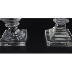 Two 19th century glass rummers, the first example with bowl engraved with floral spray and inscribed 'Success to Rochdale Canal', upon faceted stem and square base, H14cm, the second example with bowl engraved with two figures and a pagoda and inscribed 'Lawrence Taylor Esqr Capn of the Rosendale Rangers', upon a spreading stem and square base, H13cm
