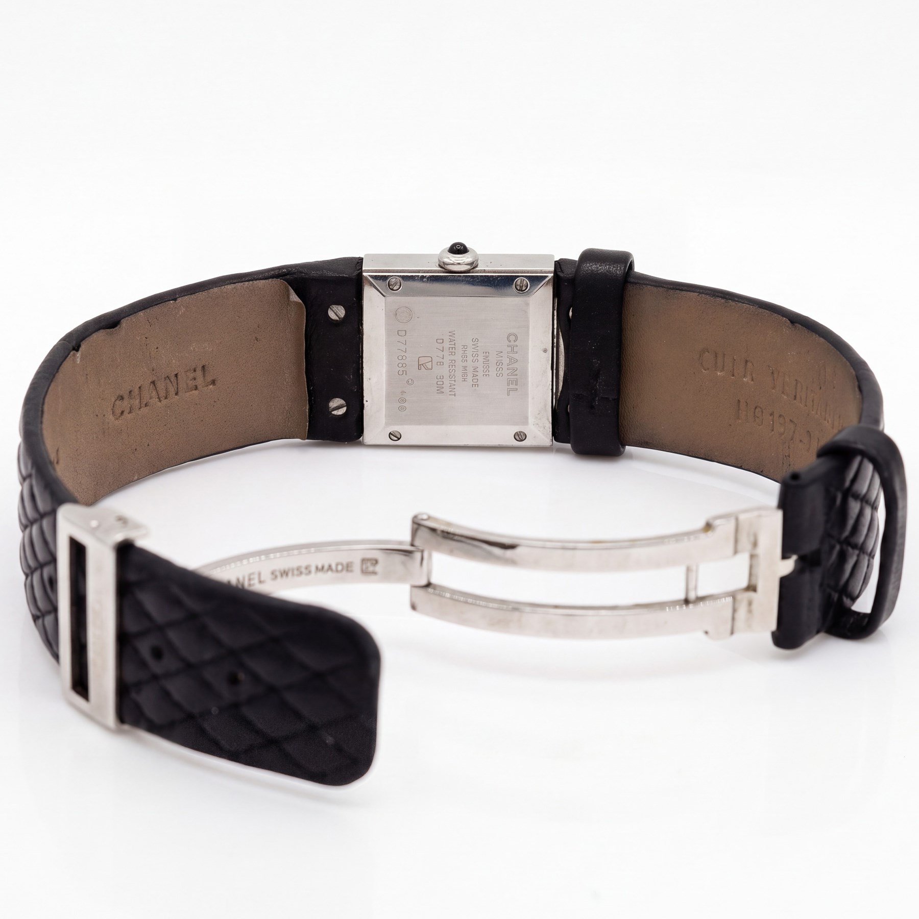 Chanel Matelassé ladies diamond stainless steel quartz wristwatch, black quilted dial, with round brilliant cut diamond bezel, back case No. 77835 and dated 2003, on quilted leather strap with fold-over-clasp 