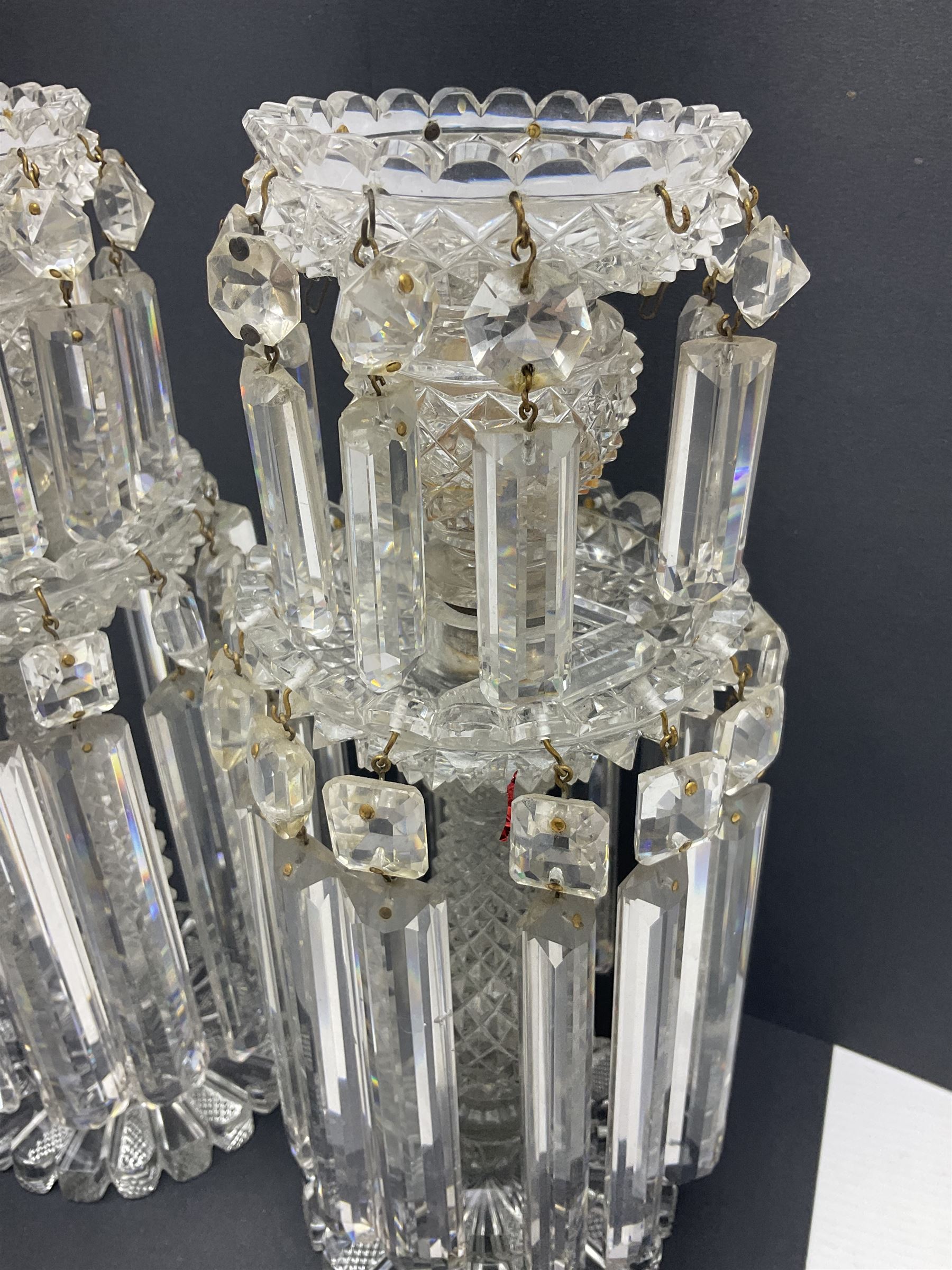 Pair of Victorian clear glass lustres, each with two tiered cut glass bowls supporting cut clear glass lustre drops upon central hobnail cut stem, H29cm