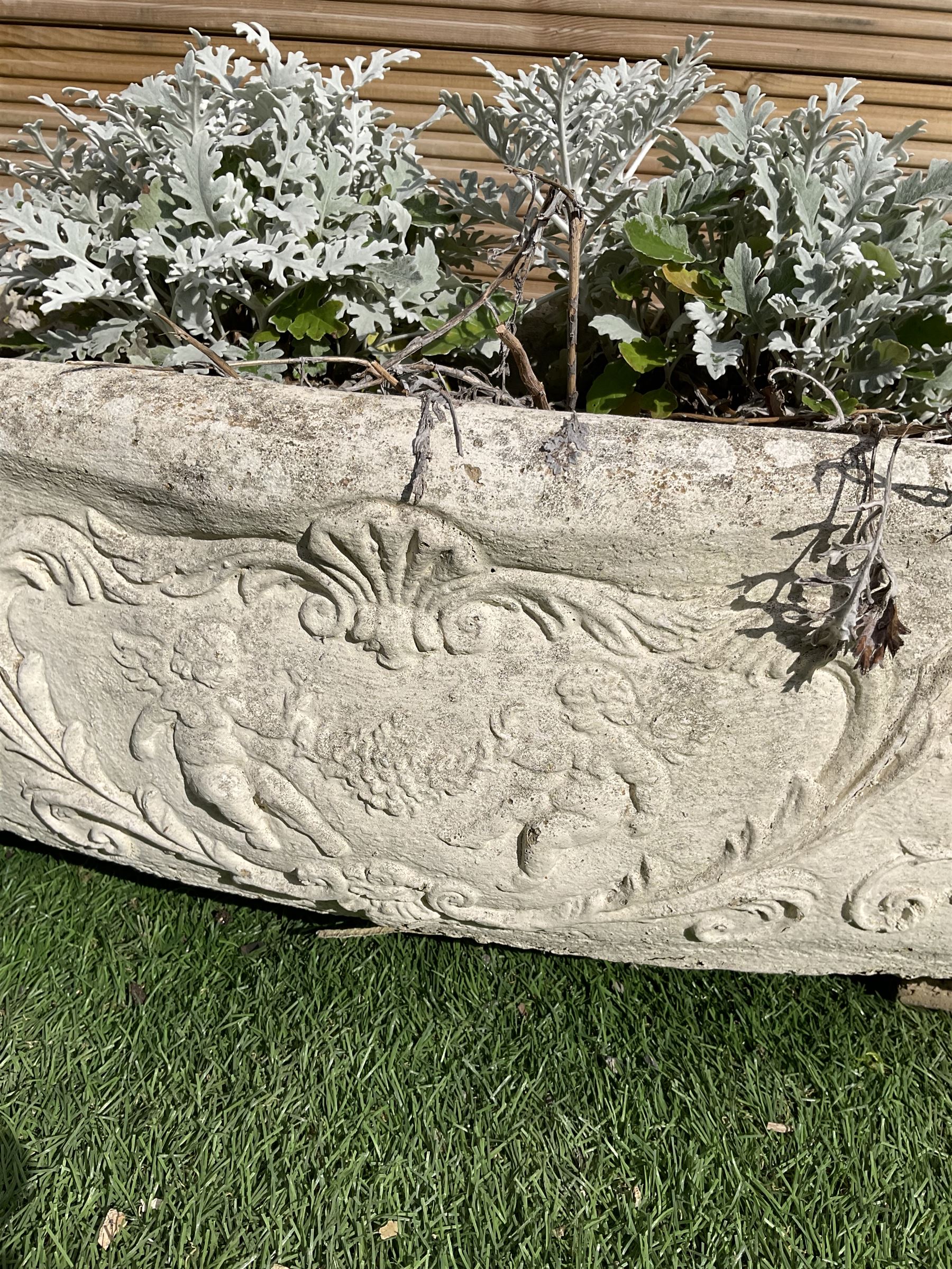 Set of three composite stone rectangular curved front planters  - THIS LOT IS TO BE COLLECTED BY APPOINTMENT FROM DUGGLEBY STORAGE, GREAT HILL, EASTFIELD, SCARBOROUGH, YO11 3TX