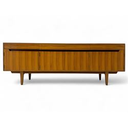 Younger - 1960s teak sideboard, three drawers over three cupboard, centre draw lined with ...