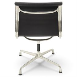 Charles and Ray Eames for Vitra - EA 105 chrome swivel chair upholstered in navy blue, raised on a four point chrome base