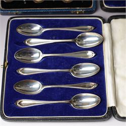 Set of six silver coffee spoons with shaped terminals, cased London 1924, another set of similar spoons London 1924 cased and a set of six silver bead knop spoons Birmingham 1936, cased