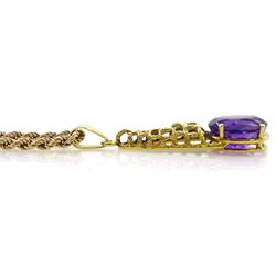 18ct gold oval amethyst pendant, stamped 750, on 9ct gold rope twist necklace hallmarked