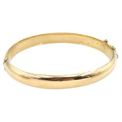 Early 20th century 14ct rose gold hinged bangle, stamped