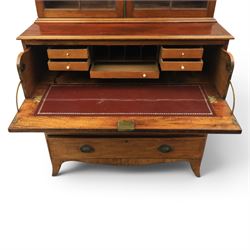 George III mahogany secretaire bookcase, the upper section with projecting cornice above astragal glazed doors, with three adjustable shelves, the lower section with secretaire drawer, fitted and with tooled leather writing surface, inlaid drawer fronts with brass handles, three graduating drawers below, raised on bracket feet