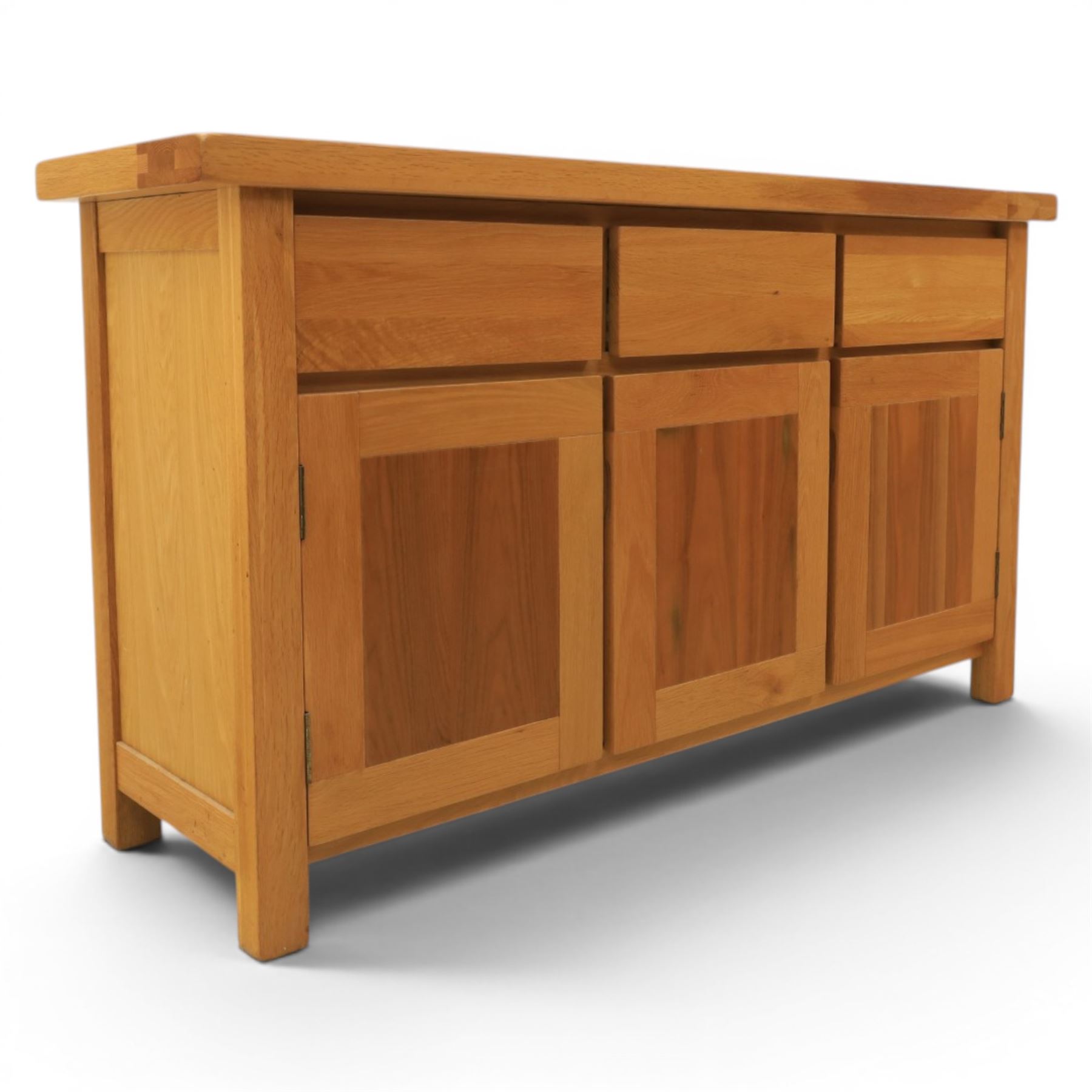 Contemporary oak sideboard, fitted with three drawers and three cupboards