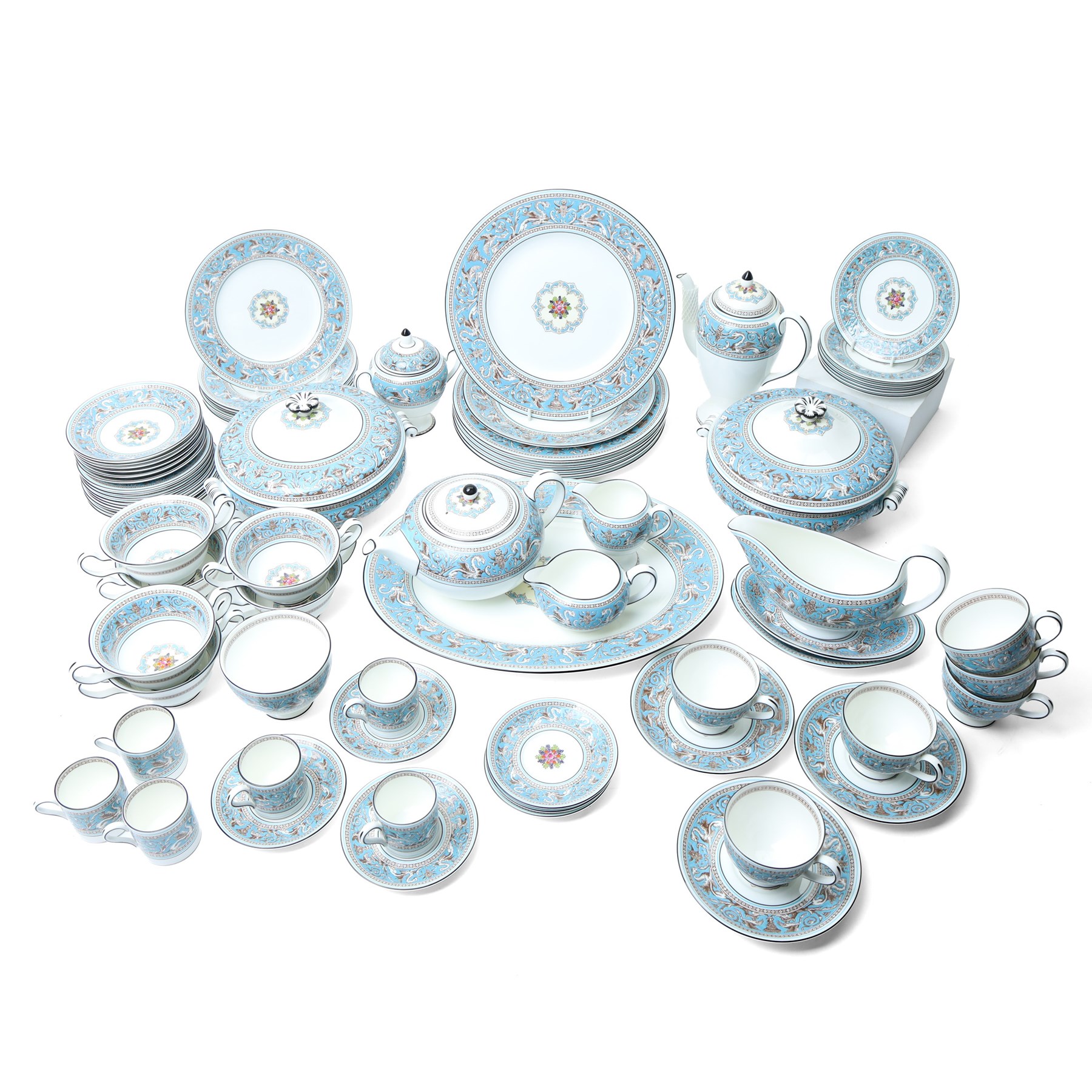 Extensive Wedgwood Turquoise Florentine part service tea, dinner and coffee service for six covers comprising six dinner plates, six dessert plates, six soup bowls and stands, pair of vegetable dishes and covers, gravy boat ad stand, oval meat plates, six tea cups and saucers, six coffee cans and saucers, six tea plates, teapot, coffee pot, sucrier and cover, sugar bowl, milk and cream jugs and cake plate, 72 pieces