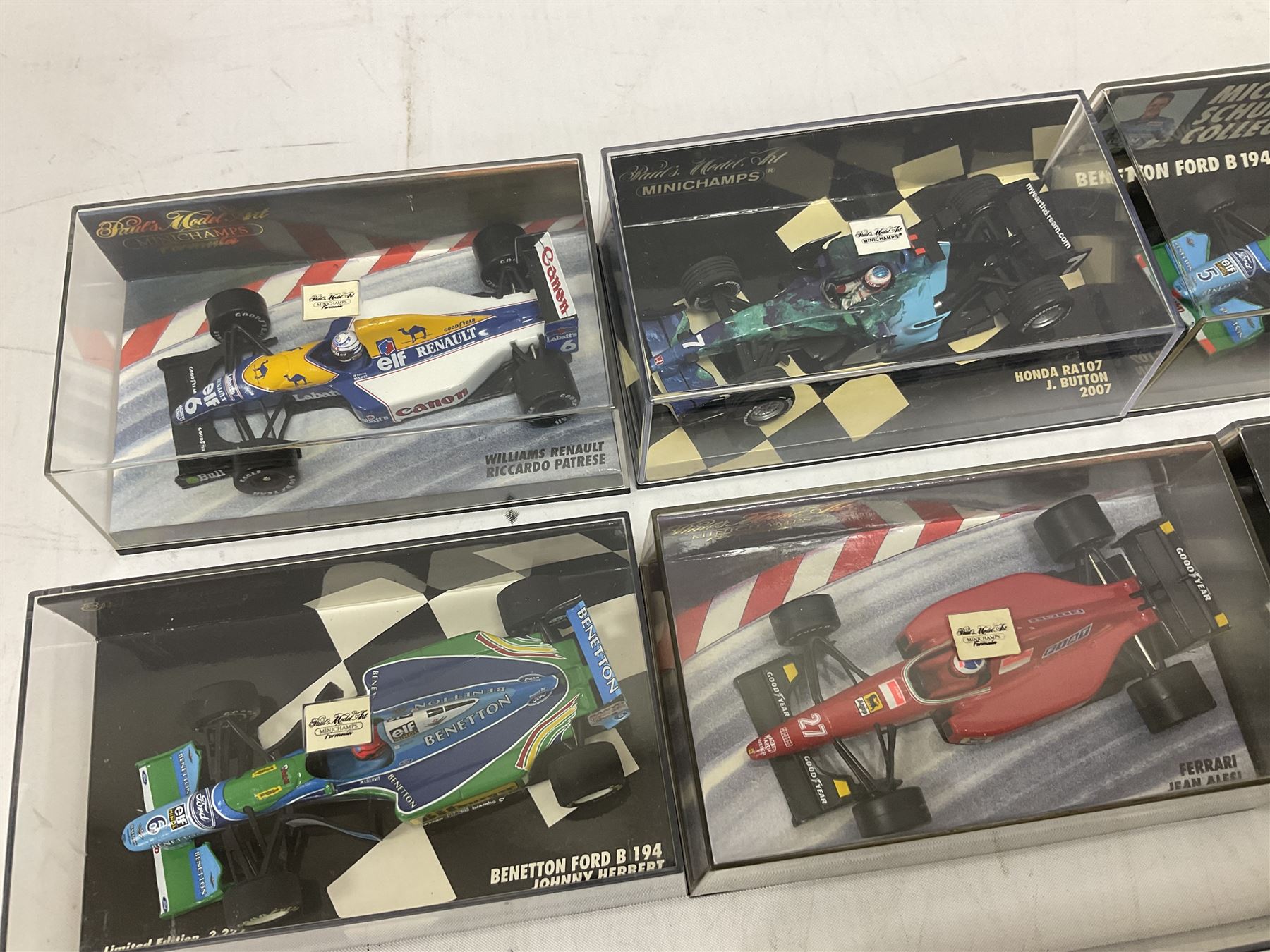 Pauls Model Art Minichamps Formula - ten 1:43 scale die-cast models of racing cars in plastic display cases (10)