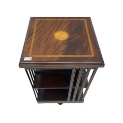 20th century mahogany revolving bookcase, inlaid centre motif, satinwood banded border
