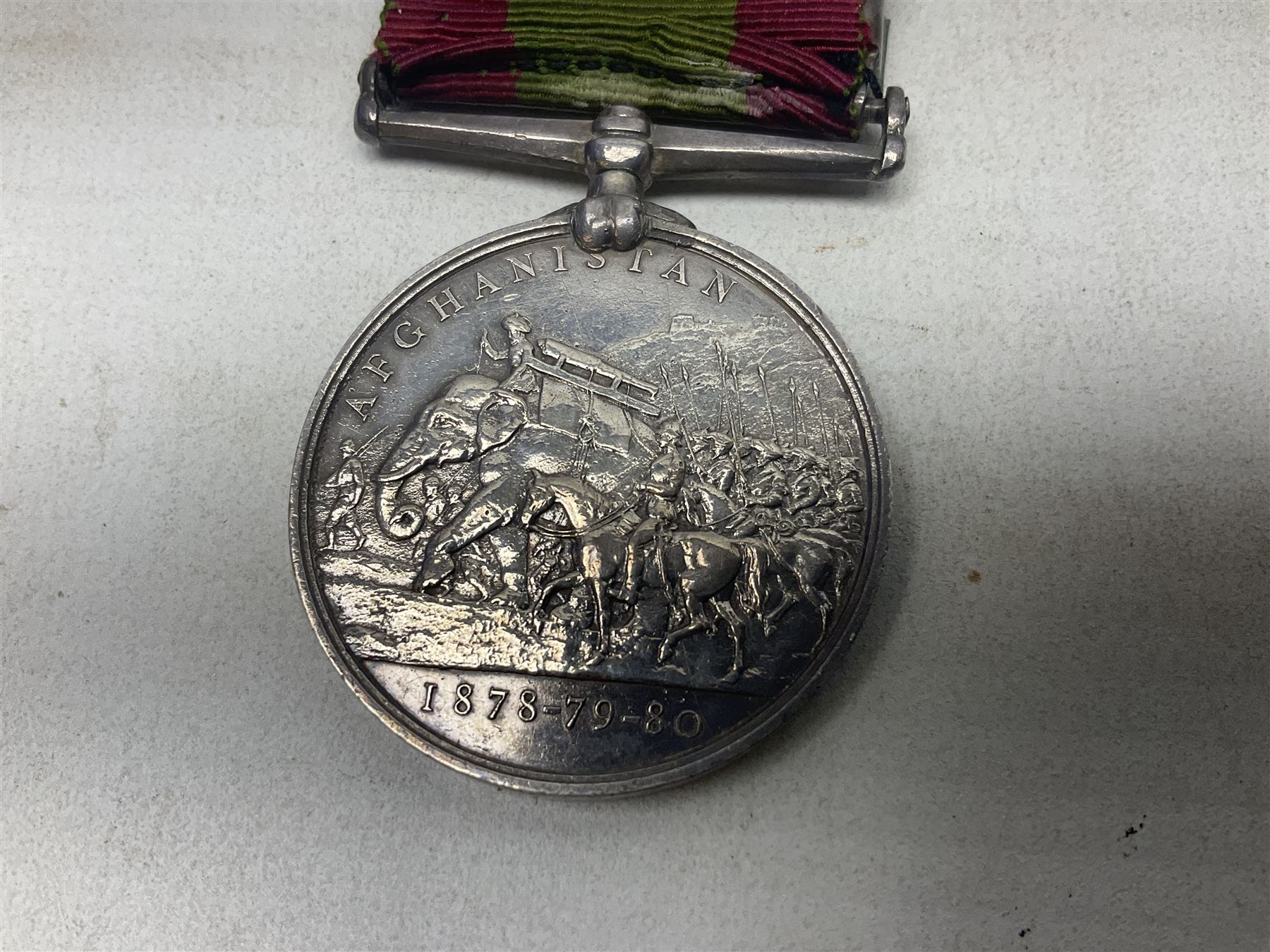 Victoria 2nd Afghanistan War Medal 1878-79-80 with three clasps for Kandahar, Kabul and Charasia, name erased, with ribbon