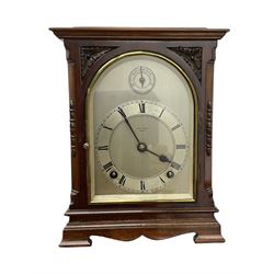 Continental early 20th century mahogany cased 8-day mantle clock, rectangular case with a flat top and fully glazed arched door to the silvered dial, separate chapter with Roman numerals, minute track and steel spade hands, subsidiary time regulation dial, with a twin train Westminster chiming movement, lever platform escapement and four gong rods. Retailed by James Ramsay, Dundee.