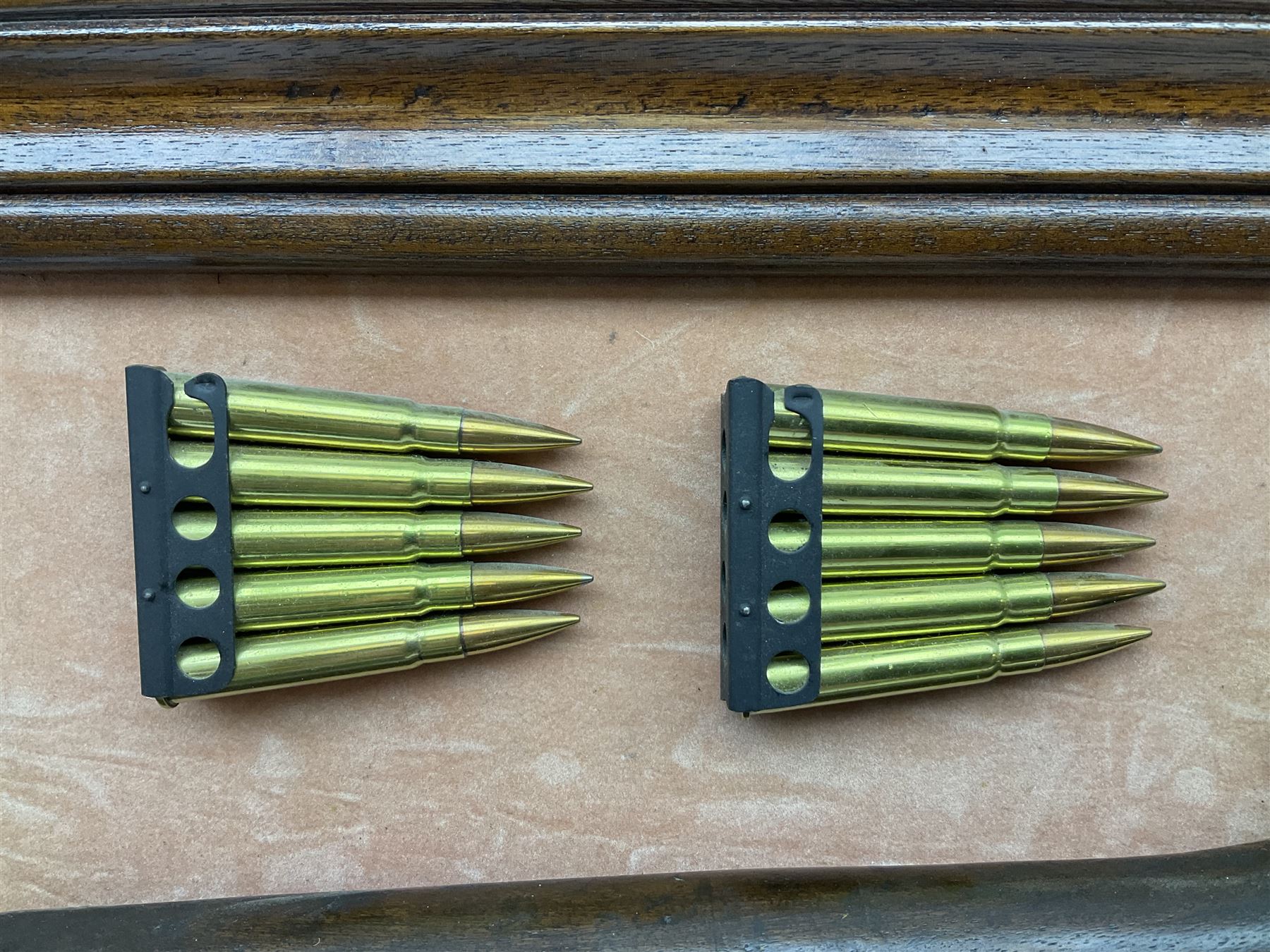 WW2 Lee Enfield No.4 Mk.1 .303 bolt-action rifle with hinged butt compartment, made by SA Ltd., Long Branch, Canada 1942, serial no.5L0646 L113cm; mounted on a framed display board with No.4 Mk.II spike bayonet, No.9 Mk.1 blade bayonet, two inert 5-round clips and brass biographical plaque by Antler Military Originals detailing DA Cert No.C3444 OLD STYLE DEACTIVATION SO FIREARMS CERTIFICATE REQUIRED OR RFD