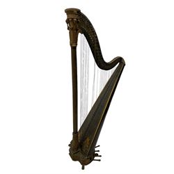 J. Erat. Wardour Street, London, Soho - Regency parcel-gilt and rosewood finish pedal harp, forty-three strings and five swell doors, the fluted pillar decorated with rams head capital, floral festoons, anthemion motifs and sarcophagi, the base decorated with pharaonic motifs and fitted with eight brass pedals, on carved paw feet, brass signature plate to top inscribed 'J. Erat. Wardour Street, London, Soho, 606'