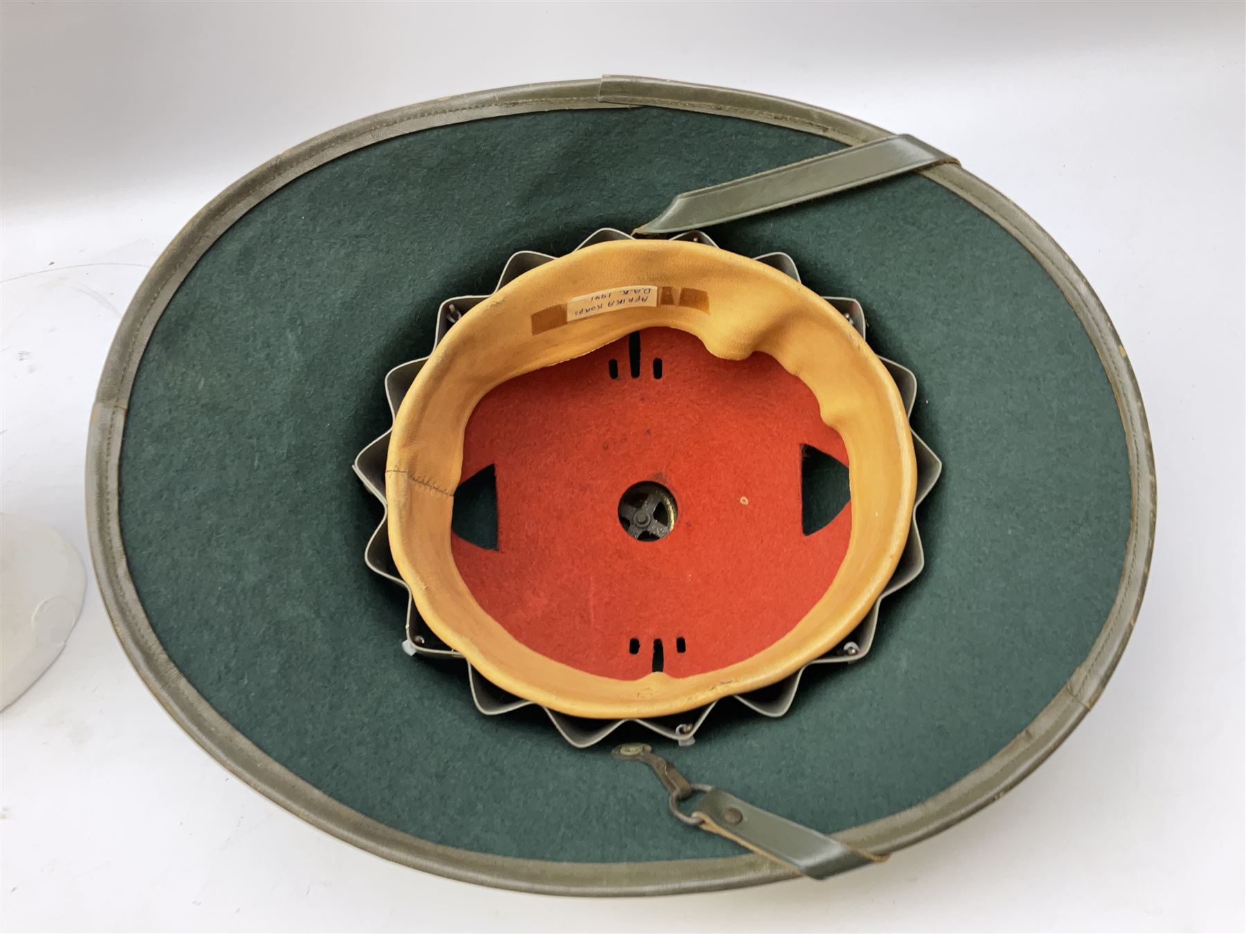 Five reproduction German WW2 hats comprising Wehrmacht olive tropical helmet, Heer officer's peaked cap, two M43 caps and Field side cap (5)