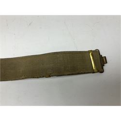 WW2 British black felt beret with Pioneer Corps cap badge, with Kangol Wear maker's mark dated 1943; and a British Army green webbing belt (2)