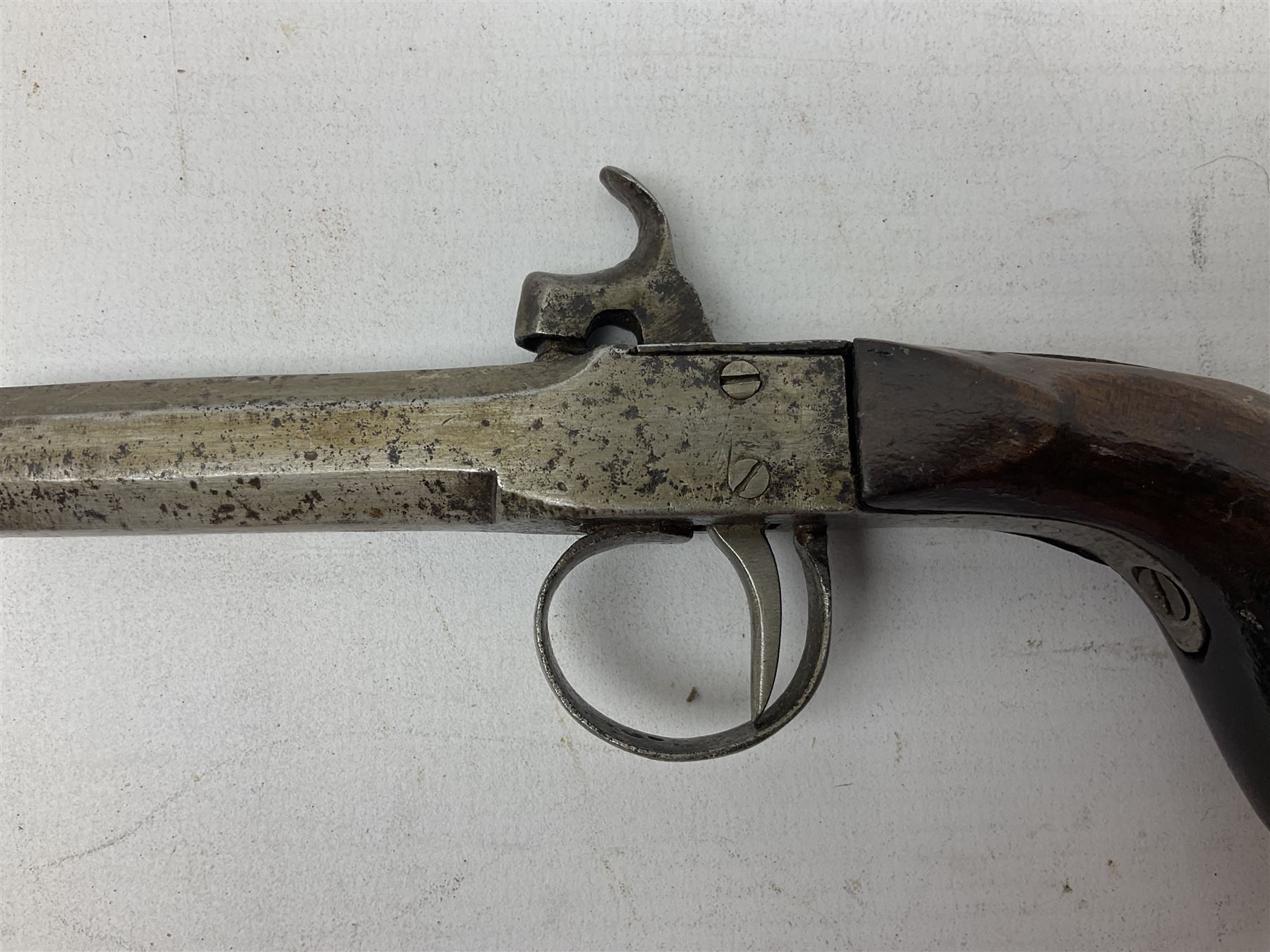 Mid 19th century double barrel percussion muff pistol, joined 7cm octagonal barrels with walnut stock19cm overall; a matching single barrel muff pistol 17cm overall (2)