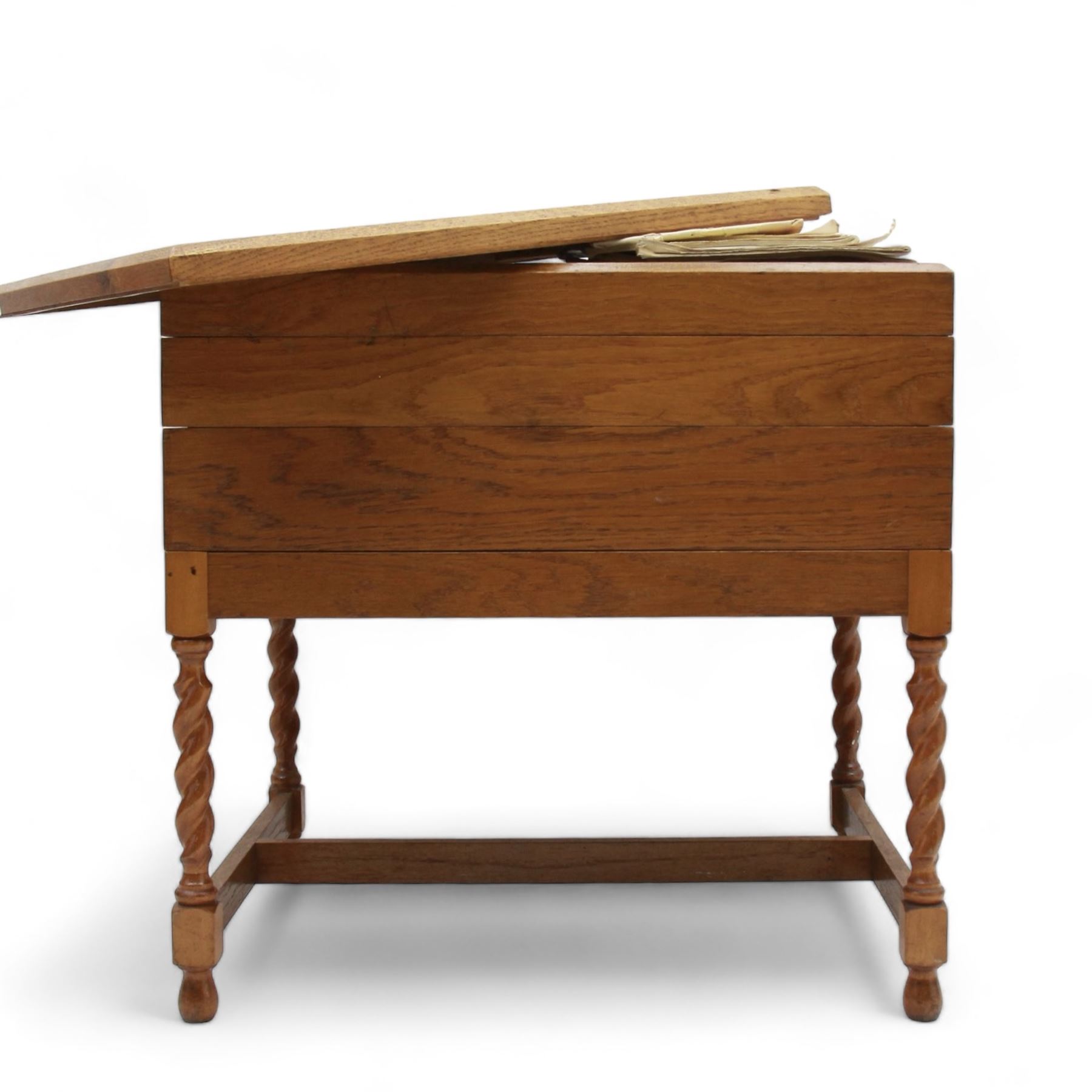 Large collection of Meccano, including perforated strips, wheels, cogs, nuts and bolts, various Meccano instruction manuals and magazines, all housed within a modified wooden box, with three tiered compartmentalised sections and upon four twist legs, box H60cm