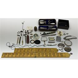 Assorted collectables, to include late Victorian/early Edwardian leather cased ladies necessaire, containing mother of pearl handled tools, four fruit knives, including a silver example, hallmarked John Yeomans Cowlishaw, Sheffield 1908, the blade with date letter for 1924, Tartan Ware thimble case containing a silver plated thimble, late 19th century oval painted portrait miniature of a lady, in ivory frame, Ronson cigarette lighter with engine turned panels, two brass mounted boxwood folding rules by Rabone, three hallmarked silver charms modelled as a watering can, ewer, and drum, small hallmarked silver whistle, hallmarked silver brooch in the form of a bow, small quantity of costume jewellery, etc. 