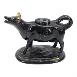 Collection of 19th century and later cow creamers, including three black glaze examples, two mottled brown examples etc  