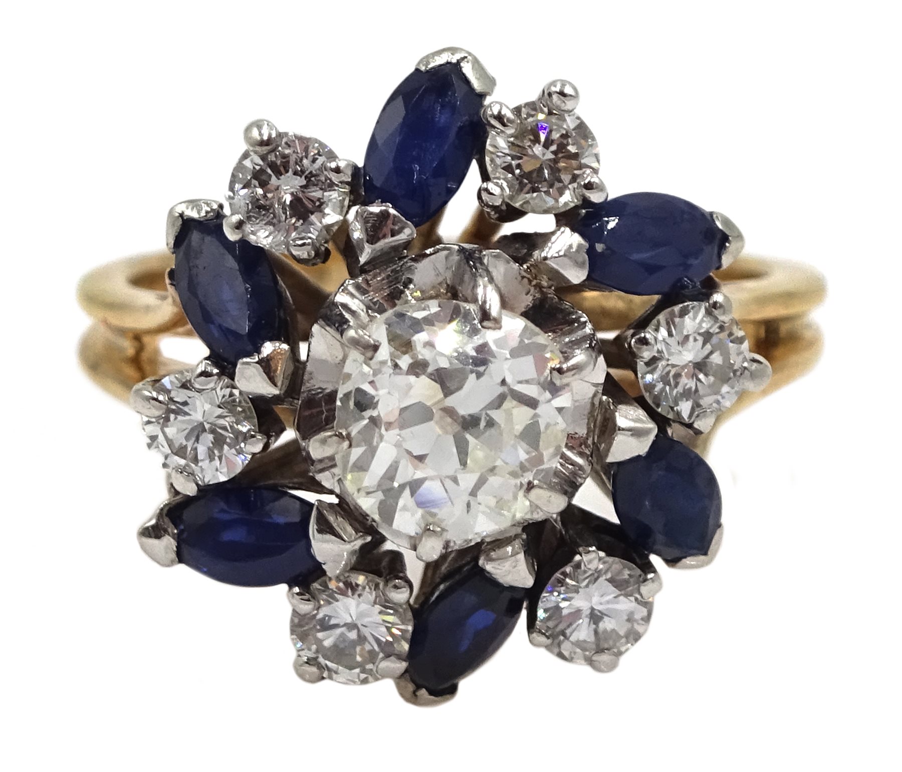 18ct gold diamond and sapphire ring, the central old cut diamond of approx 0.75 carat, with round brilliant cut diamonds and marquise cut sapphires