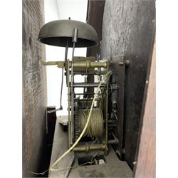 Early 19th century oak longcase clock, shaped pediment over a stepped arch glazed door enclosed by plain pilasters, the case with canted corners and trunk door with sloped arch top and centre curved return, enamel Arabic dial painted with flowers and patterned spandrels, signed 'Jno. Hilbert, Haxby', eight-day movement with subsidiary seconds dial and false calendar dial 