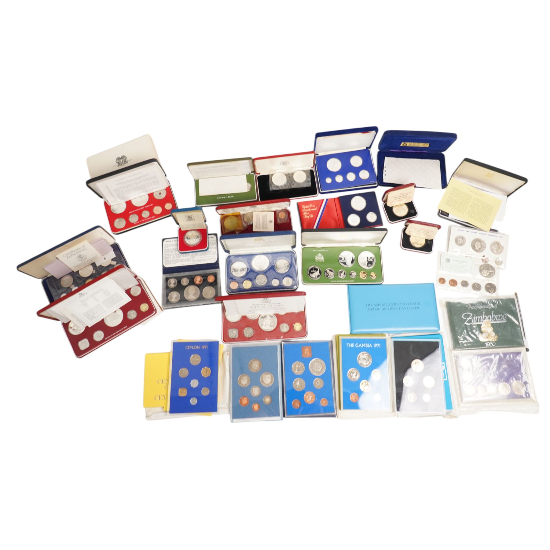 Twelve international proof coin sets, all produced by The Franklin Mint and containing high denomination silver coins, comprising two Republic of the Philippines 1975 proof eight coin sets, two Commonwealth of the Bahamas proof nine coin sets, 1973 and 1976, Guyana 1976 proof eight coin set, Jamaica 1976 proof nine coin set, Papua New Guinea 1976 proof eight coin set, First National Coinage of Barbados 1973 proof eight coin set, Ethiopia 1977 proof five coin set, Republic of Seychelles 1976 proof eight coin set, British Virgin Islands 1977 Royal Silver Jubilee proof six coin set, First Official Coinage of the British Virgin Islands 1973 proof six coin set; together with Pobjoy Mint Isle of Man 1977 silver proof seven coin set, 'Commemoration of the 1100th Anniversary of the Settlement of Iceland' 1974 proof two coin set, The Royal Mint United Kingdom 1977 Silver Jubilee silver proof crown coin, and other international proof sets