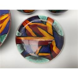 Four pieces of Poole Pottery in Graffiti pattern, comprising pair of vases of baluster form, dish and small plate, with impressed or printed marks beneath, vase H17cm