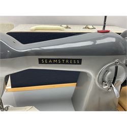 Seamstress sewing machine in case, together with a Singer sewing book