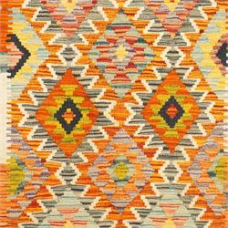 Afghan Chobi flatweave kilim and an Afghan Chobi flatweave kilim runner, with a repeating stepped diamond medallion design in ivory, green, rust, teal, purple, and indigo, framed by chevron and geometric borders, 148x53cm & 129x80cm, (2)