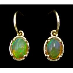 Pair of 9ct gold opal pendant stud earrings, stamped 9K
