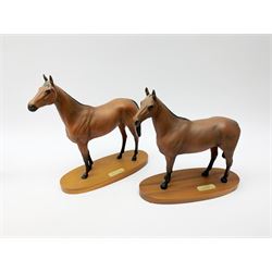 Four Royal Doulton horse figurines, comprising Red Rum, Arkle, and the Winner DA154, and another modelled as a prancing bay horse, largest H32cm. (4). 