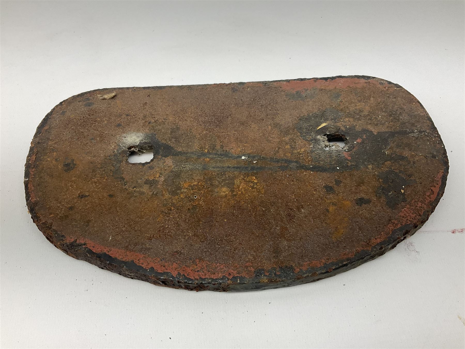 Three cast iron railway wagon plates of D shaped form to include Southern Railway, LMS and GWR, L27.5cm