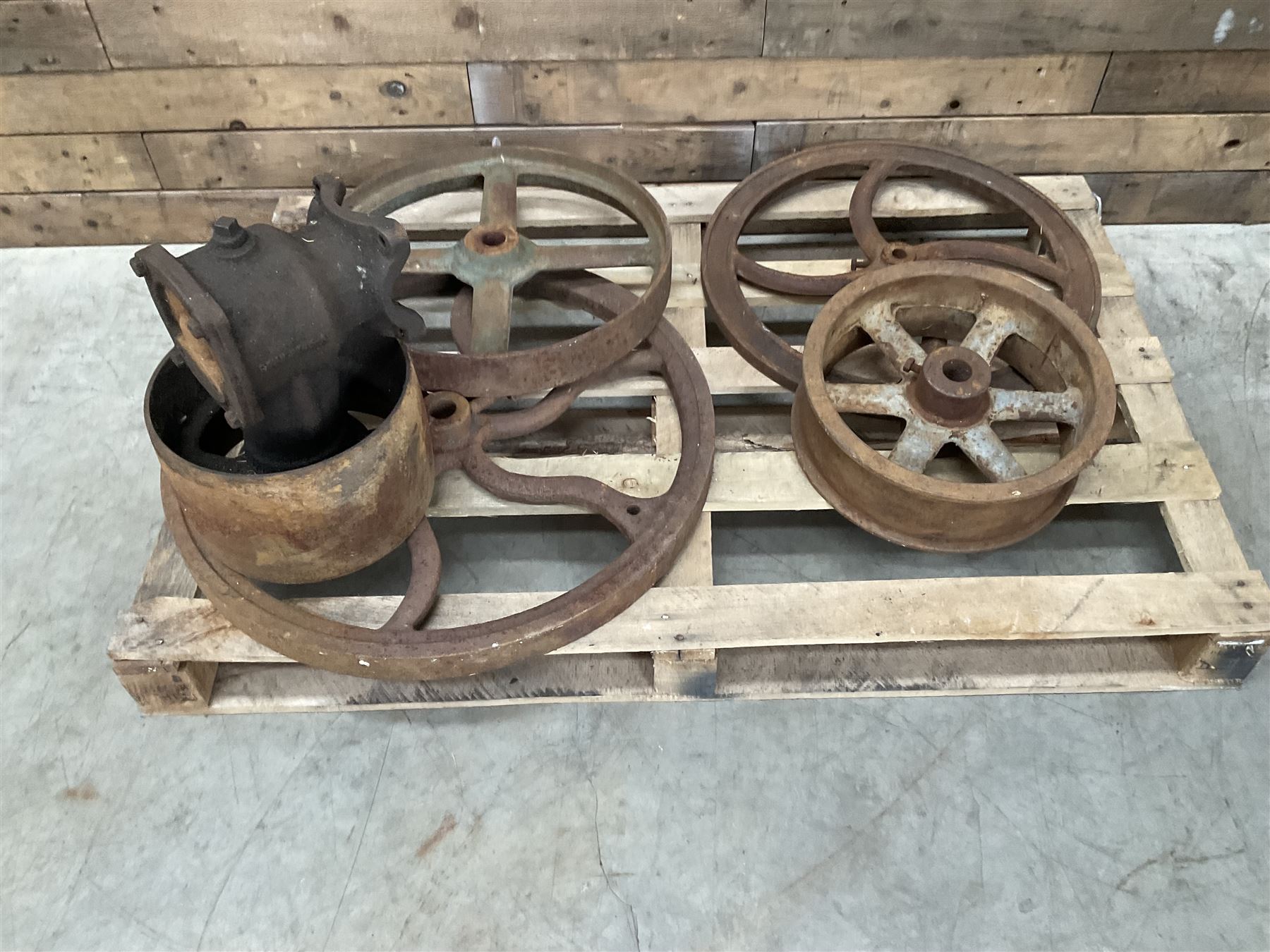 Various cast iron implement wheels