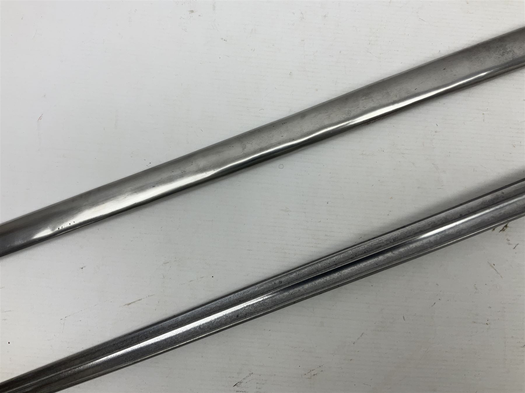 Early 19c French 1st Empire Heavy Cavalry trooper's sword, the 95.5cm double fullered blade with various stamped marks and inscribed Klingenthal 1814 to the back edge, four-bar brass hilt with wire-bound leather grip, knucklebow numbered 139; in polished steel scabbard with two suspension rings L117cm overall