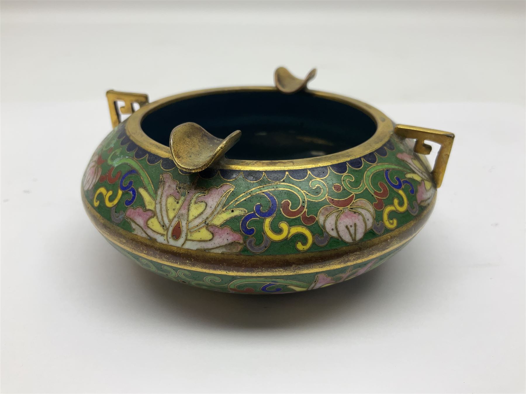 20th century Chinese cloisonne enamel smoking set, comprising two ashtrays, box and tray, with floral and foliate scrolling on green ground